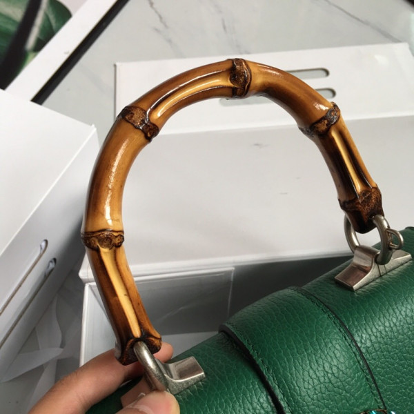 G*u*i bamboo bag